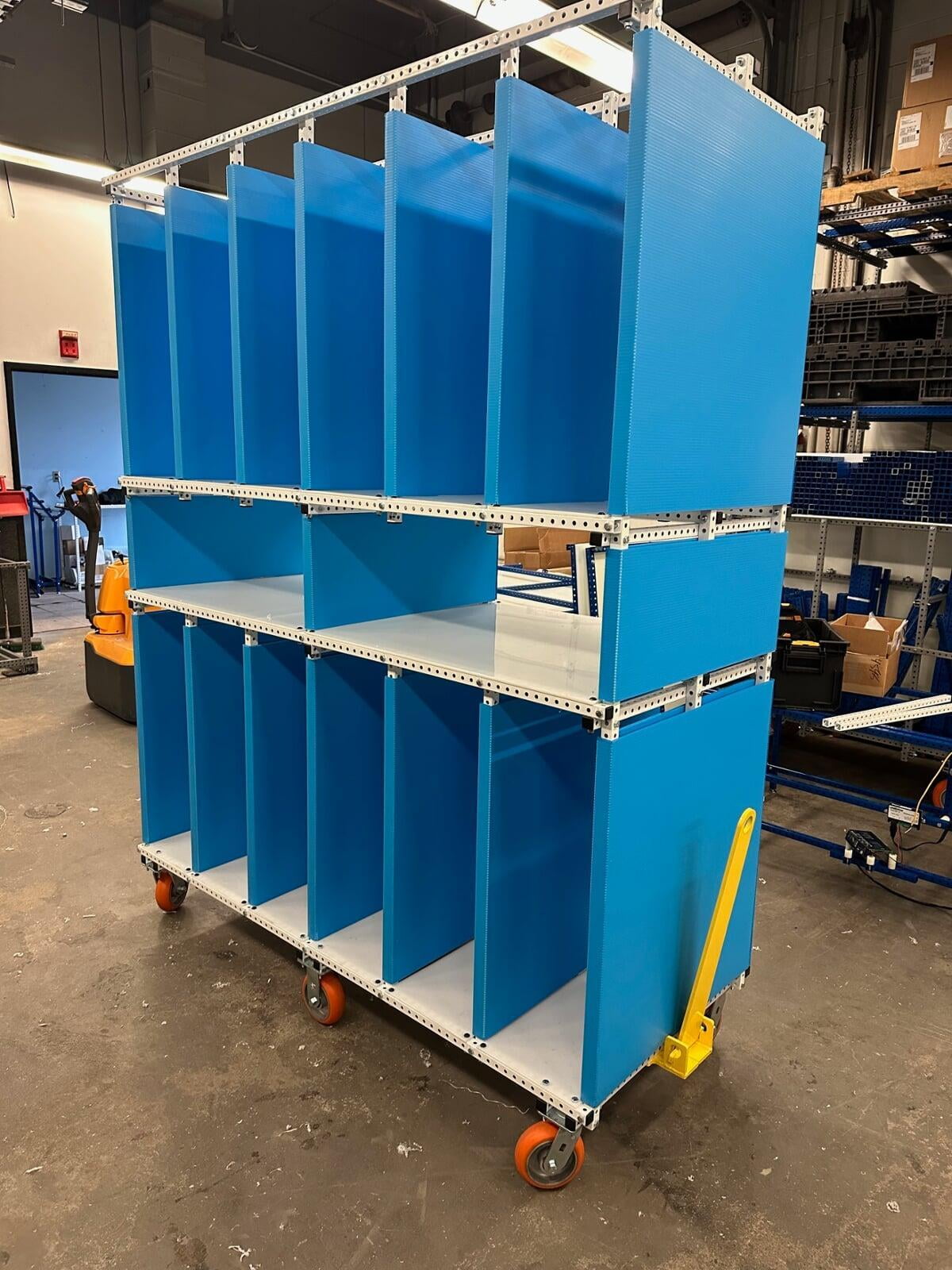 Lean Process Improvement, Before and after at Johnson Controls Facility. Cart made with better ergonomics and safety for operators.
