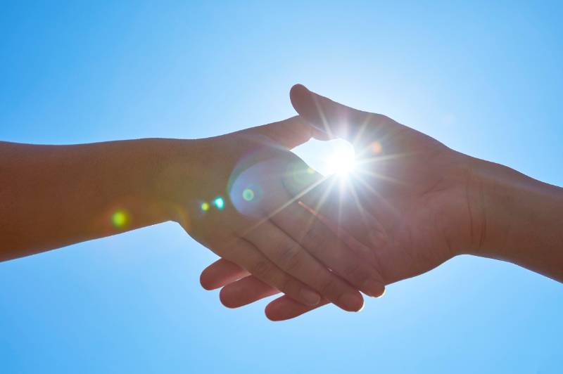 Mechanic inspecting a diesel truck in a service bay