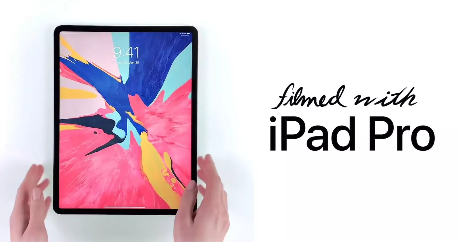iPad Pro con pantalla encendida mostrando fondo artístico colorido, acompañado del texto 'Filmed with iPad Pro', ideal para compra en Pereira, Colombia. iPad Pro con pantalla encendida mostrando fondo artístico colorido, acompañado del texto 'Filmed with iPad Pro', ideal para compra en Pereira, Colombia.