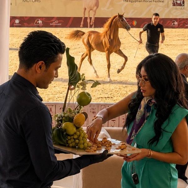 LOriental service member serving theatrical passarounds at ASEEL Egyptian Horse Festival