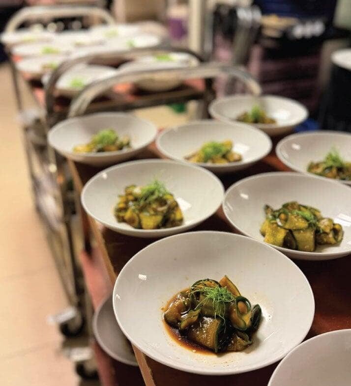 Asisan cucumber salad on food trolley heading for guests Asisan cucumber salad on food trolley heading for guests