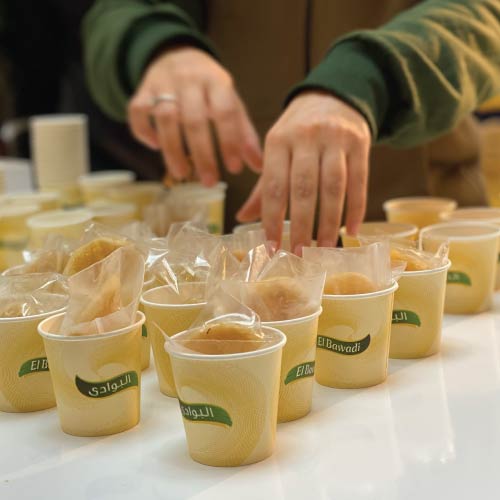 Activation team preparing mini fiteer meshaltet packs with Bawadi molasses at Nationwide activation campaign Activation team preparing mini fiteer meshaltet packs with Bawadi molasses at Nationwide activation campaign