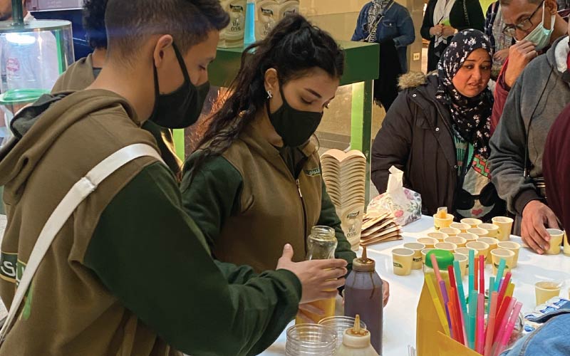 Activation team preparing mini fiteer meshaltet packs with Bawadi molasses at Nationwide activation campaign Activation team preparing mini fiteer meshaltet packs with Bawadi molasses at Nationwide activation campaign