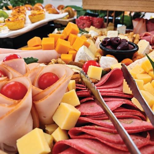 Assorted cheeses and cold cuts from breakfast menu at British Embassy event Assorted cheeses and cold cuts from breakfast menu at British Embassy event