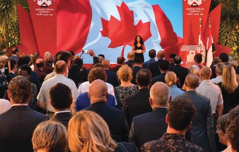 Canada Day reception at the Canadian Embassy in Cairo with guests and Canadian flag backdrop, catered by LOriental Moments Canada Day reception at the Canadian Embassy in Cairo with guests and Canadian flag backdrop, catered by LOriental Moments