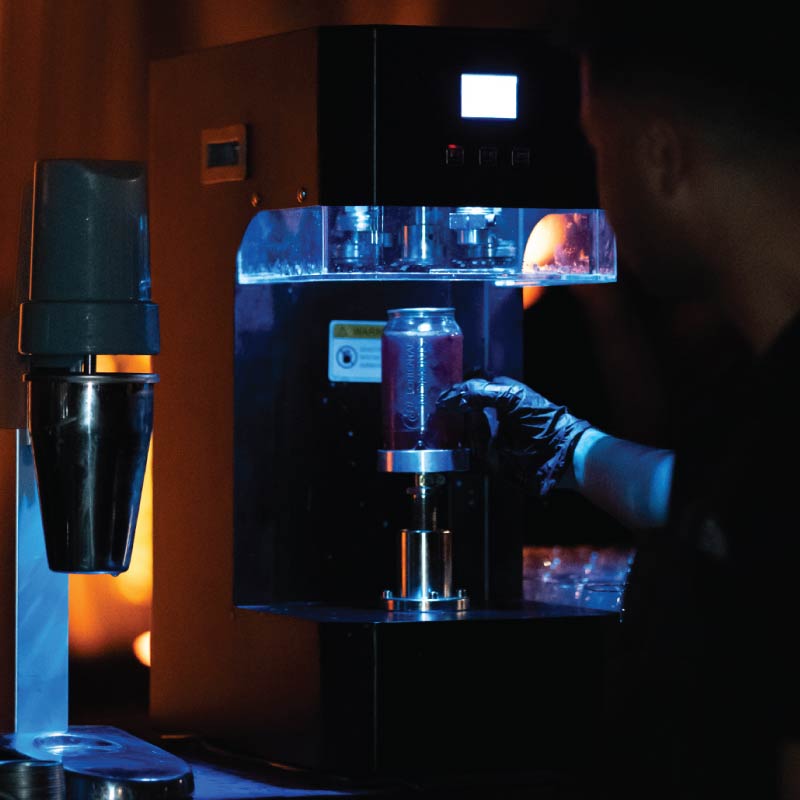 LOriental live bar can-sealing machine sealing a freshly prepared boba creation during a Pyramids of Giza event