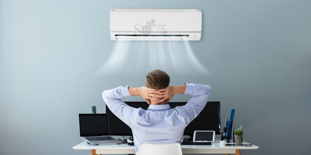 A sleek white 1.5 Ton Inverter Split AC unit from Me Shop mounted on a modern living room wall.