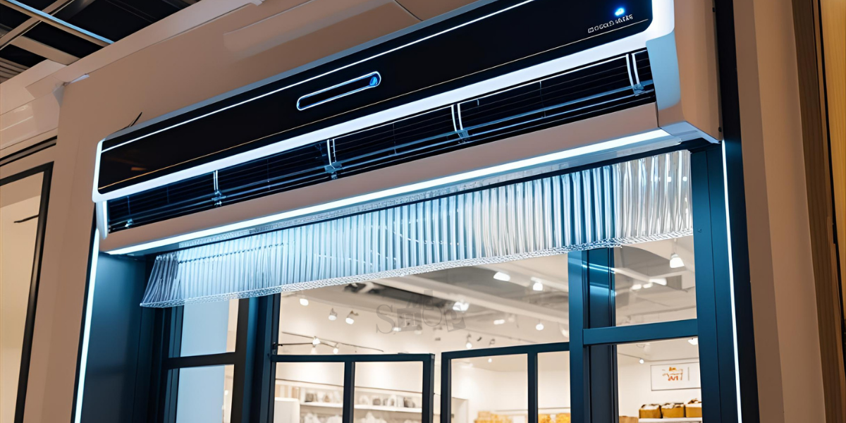 Commercial entrance with a sleek, modern air curtain installed above. Commercial entrance with a sleek, modern air curtain installed above.