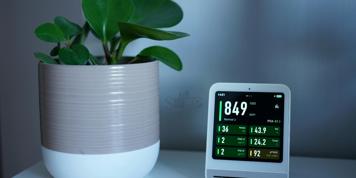 A modern living room with an air wellness purifier.