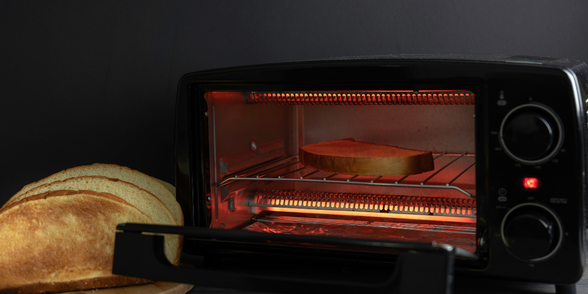 A modern Me Shop Oven Toaster Griller oven in a kitchen. A modern Me Shop Oven Toaster Griller oven in a kitchen.