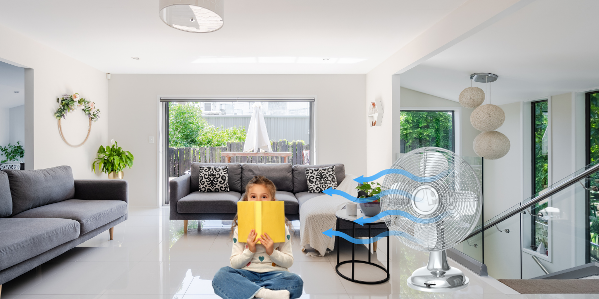 A stylish Me Shop table fan cooling a modern office desk.
