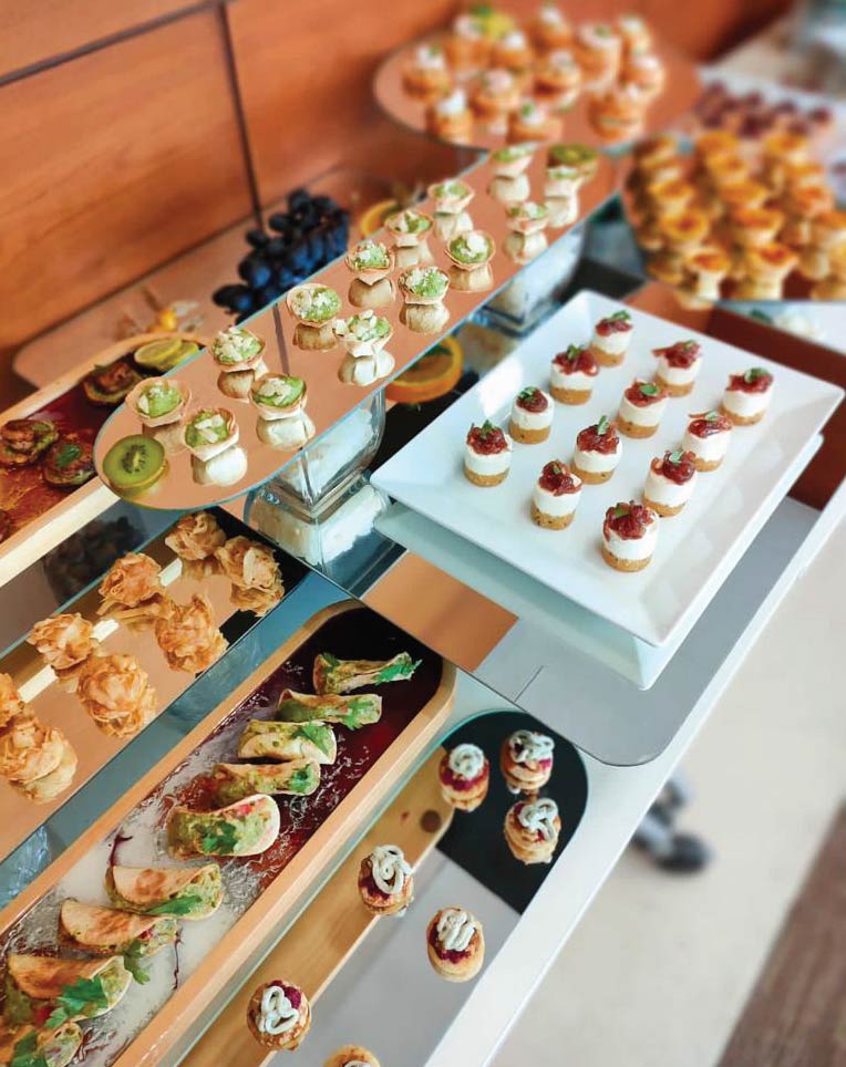LOriental buffet in Nov 2022 for GIG Insurance featuring chicken taco bites, roquefort and beetroot blinis, goat cheesecake with red onion jam LOriental buffet in Nov 2022 for GIG Insurance featuring chicken taco bites, roquefort and beetroot blinis, goat cheesecake with red onion jam