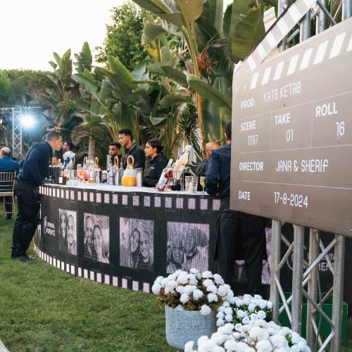 Digital bar showing animated filmstrip at Sherif and Jana katb ketab