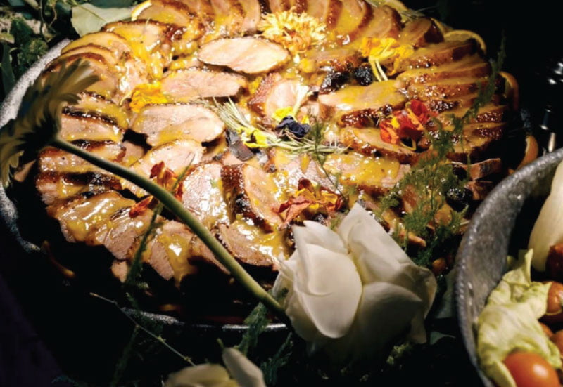 Duck breast with orange sauce at a LOriental open buffet