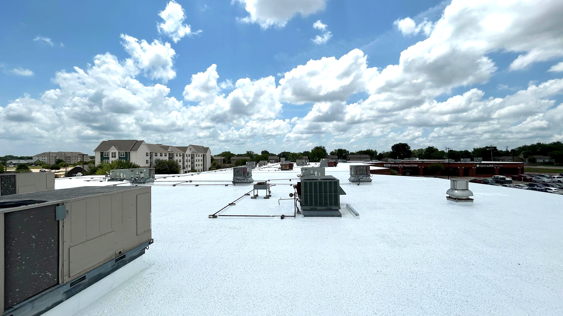 White roof coating on a commercial building