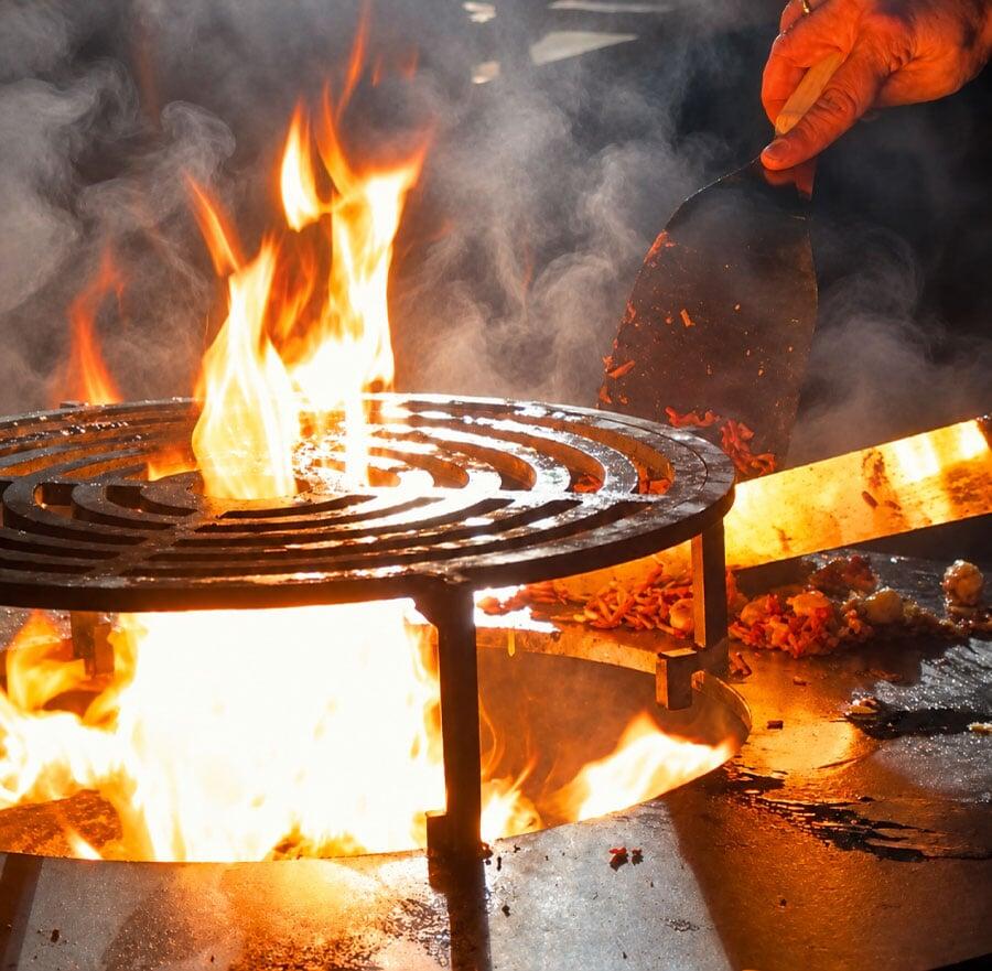 Fire and smoke at Mongolian BBQ Grill live station at LOriental event in Maison de Joie on 10 July 2026 Fire and smoke at Mongolian BBQ Grill live station at LOriental event in Maison de Joie on 10 July 2026