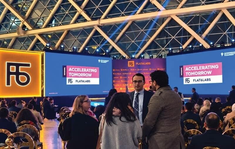 Flat6Labs Cairo Demo Day at the Grand Egyptian Museum with startup audience and stage, catered by LOriental Moments