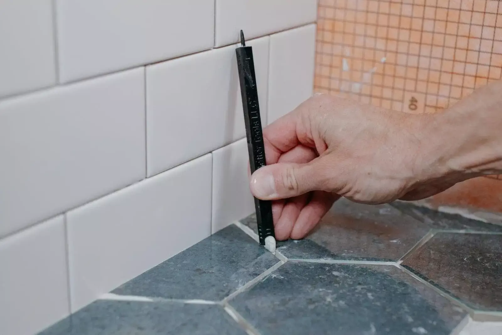 ThinStick grout trimming tool. ThinStick grout trimming tool.