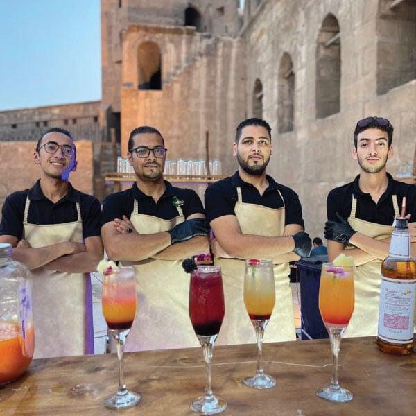 LOriental baristas posing behind bar at Bir Youssef event LOriental baristas posing behind bar at Bir Youssef event