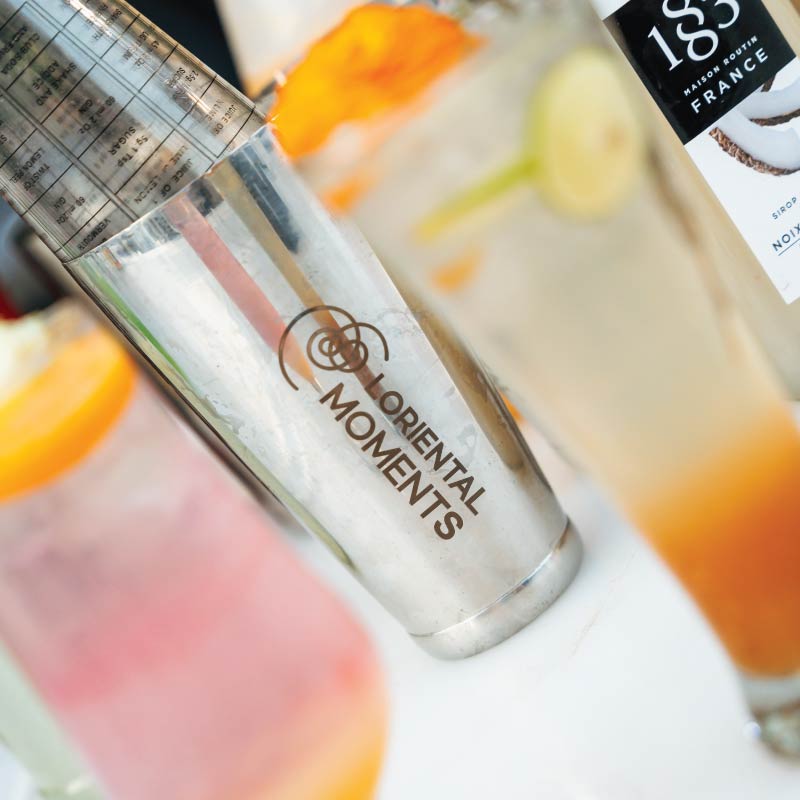 LOriental branded cocktail shaker beside freshly prepared non-alcoholic drinks at the Live Bar LOriental branded cocktail shaker beside freshly prepared non-alcoholic drinks at the Live Bar