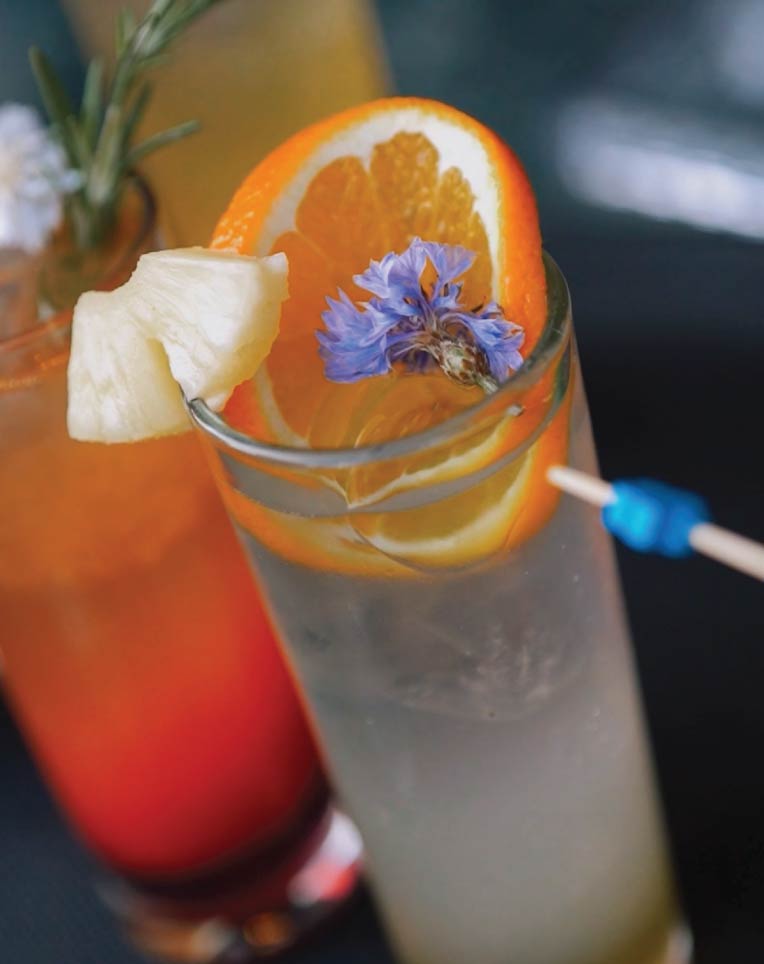Non-alcoholic LOriental cocktails finished with fresh citrus, fruit and edible flower garnishes Non-alcoholic LOriental cocktails finished with fresh citrus, fruit and edible flower garnishes