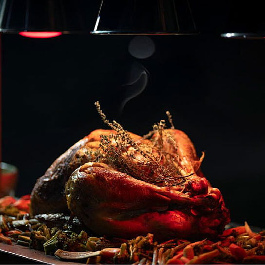 Whole roasted turkey ready for carving at a LOriental live carving station Whole roasted turkey ready for carving at a LOriental live carving station