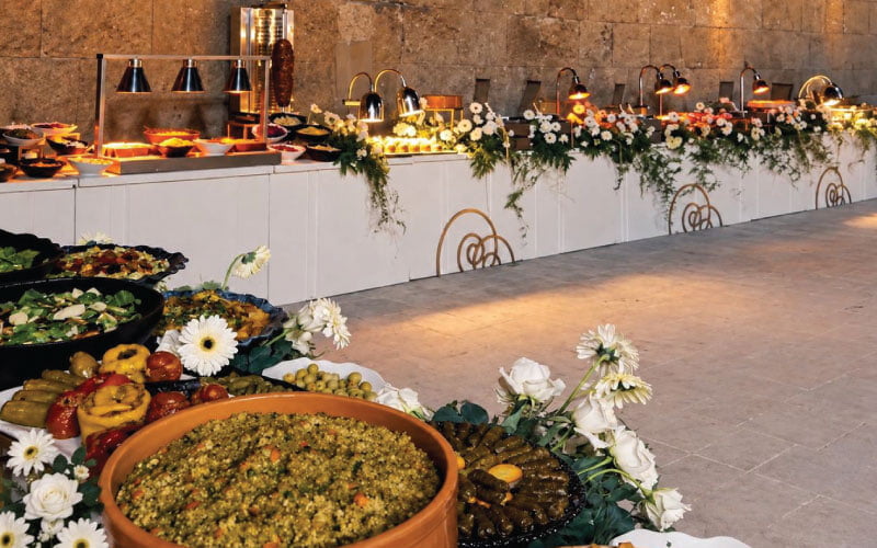 LOriental main course open spread with floral decorations