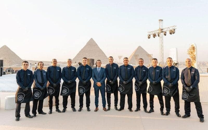 LOriental service team posing at the Pyramids before event, photo taken 16 Aug 2024 LOriental service team posing at the Pyramids before event, photo taken 16 Aug 2024