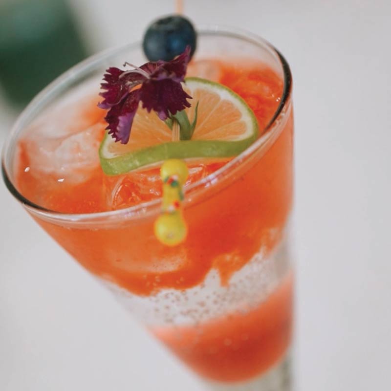 LOriental non-alcoholic colorful cocktail at an event