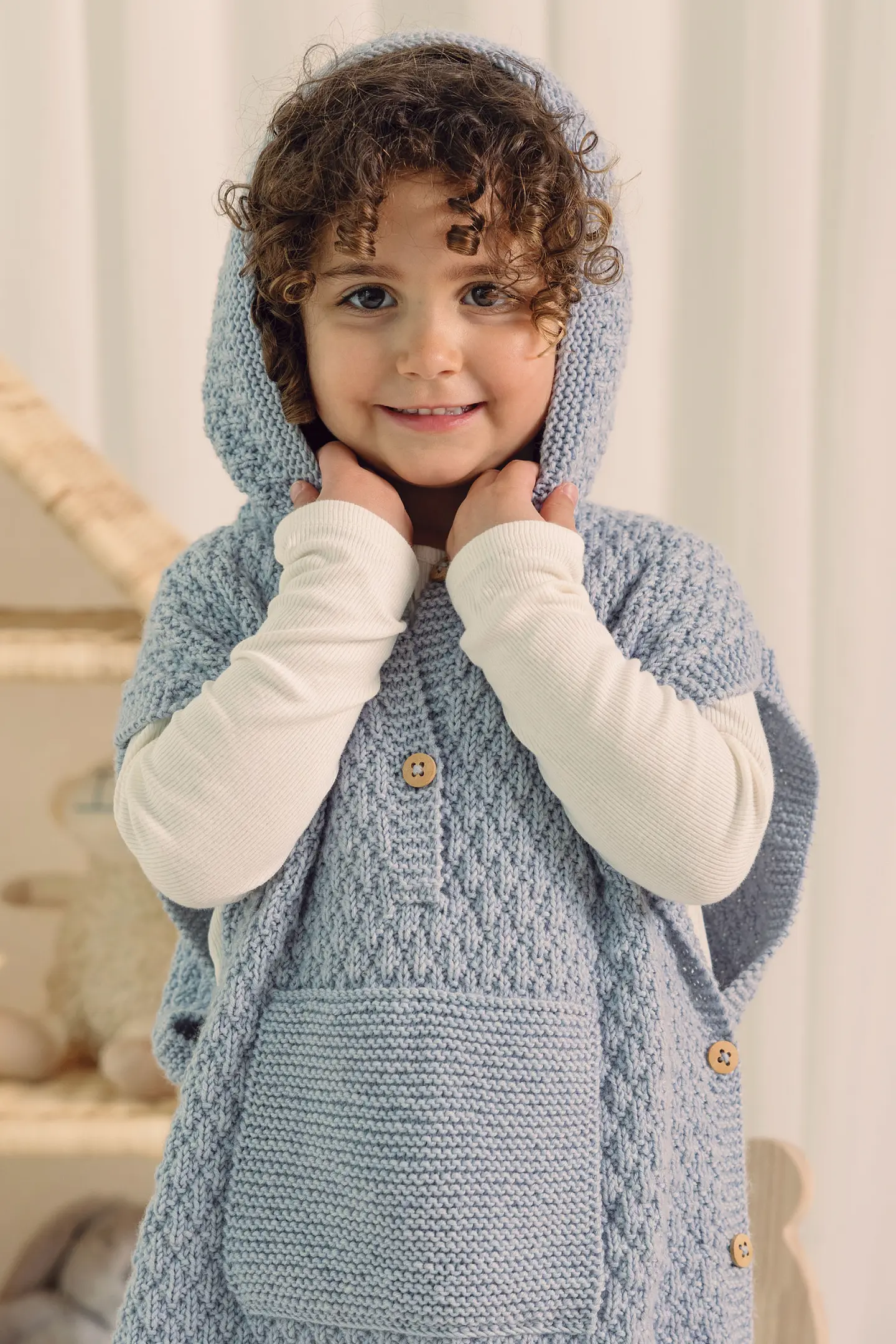 Vestitino realizzato con 100% Baby 4 di DMC Vestitino realizzato con 100% Baby 4 di DMC