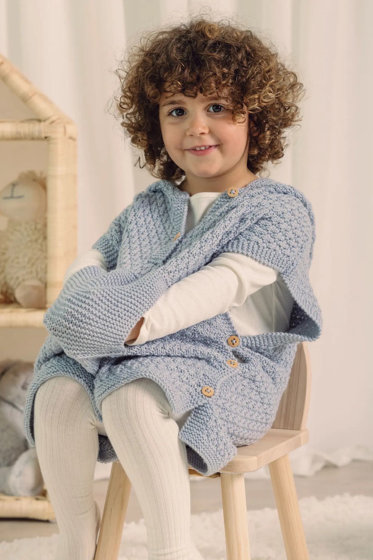 Vestitino realizzato con 100% Baby 4 di DMC Vestitino realizzato con 100% Baby 4 di DMC