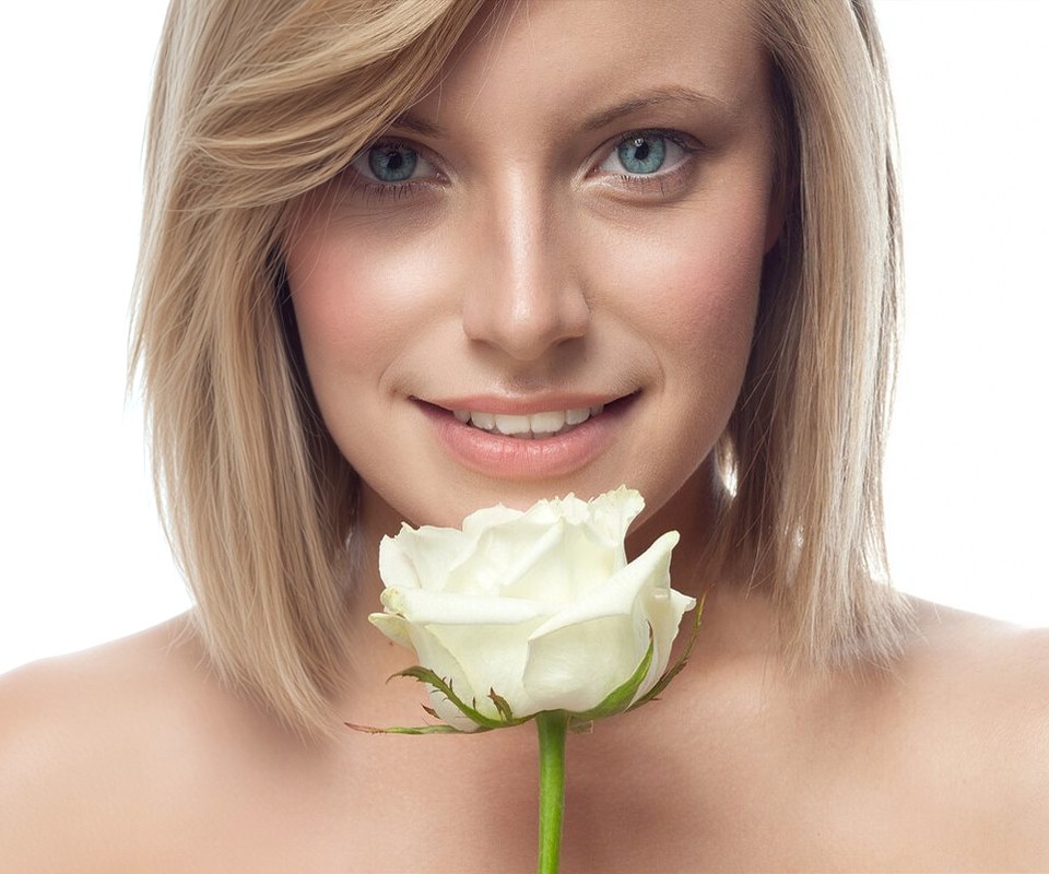 Needleless mesotherapy oxygen facial at Vancouver Green Spa in downtown Vancouver: smiling woman with a white rose