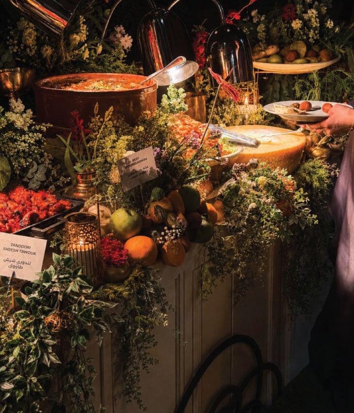 LOriental open buffet spread with floral decor