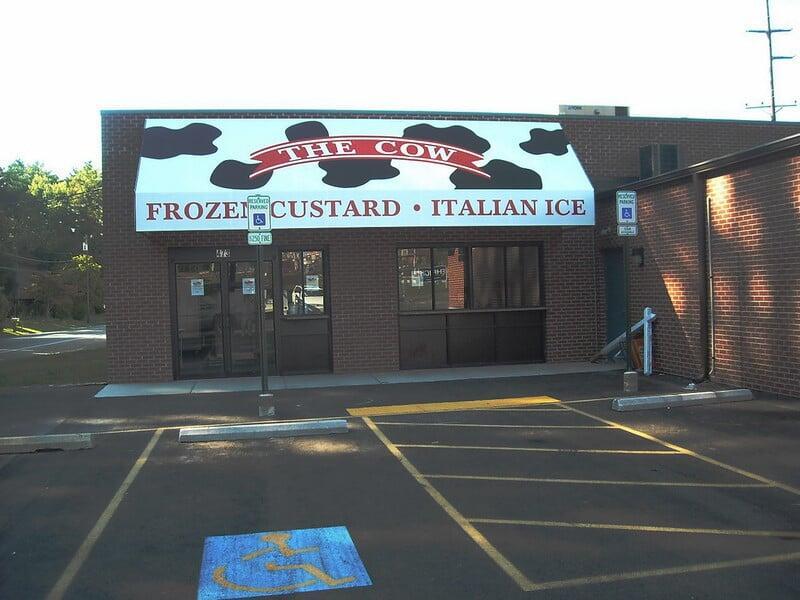 008 — Traditional Shed with Signband Awning Canopy Fabric by MG Sign, the leading signage company in New York and New Jersey.