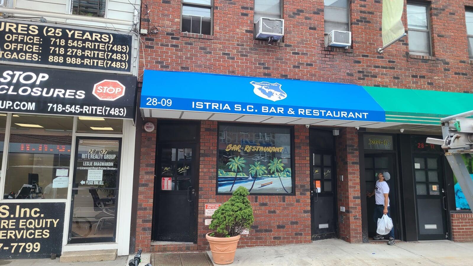 008 — Traditional Shed with Signband Awning Canopy Fabric by MG Sign, the leading signage company in New York and New Jersey.