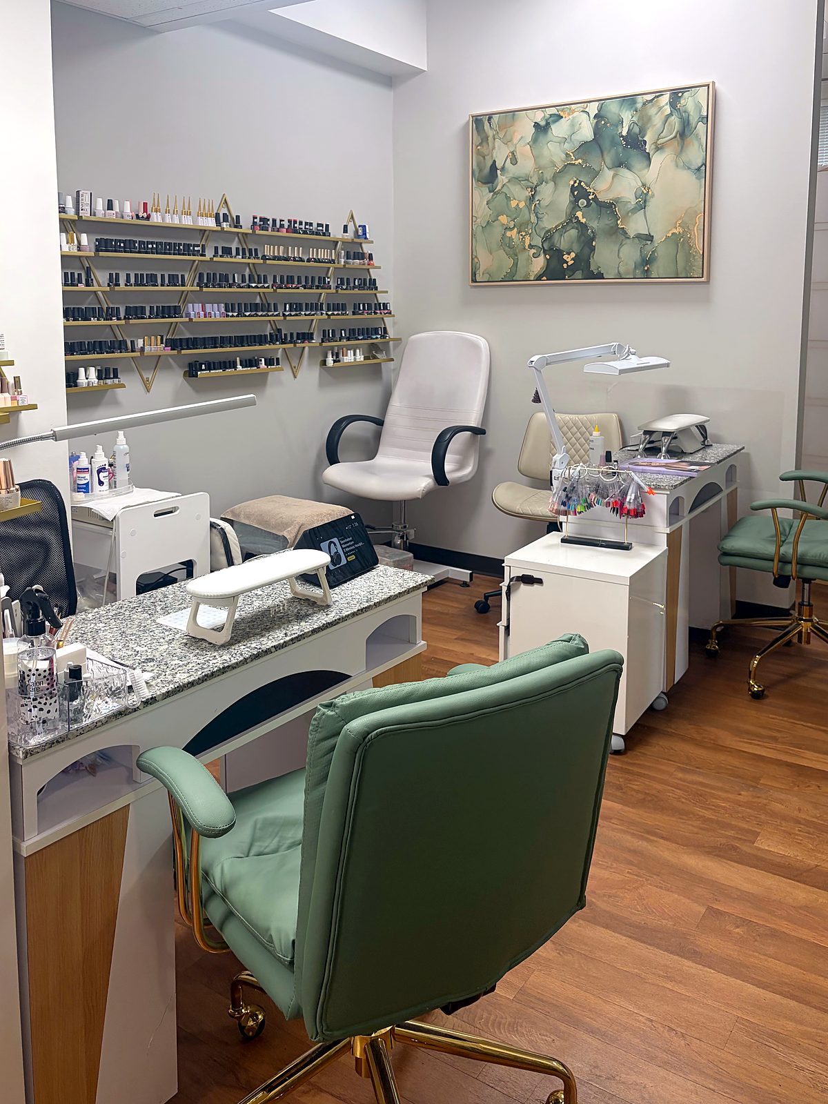 Manicure and pedicure room with a wall of nail polish colours at Vancouver Green Spa, Vancouver