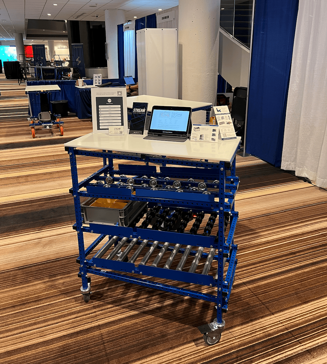 Flow Rack with Conveyors and Wheels