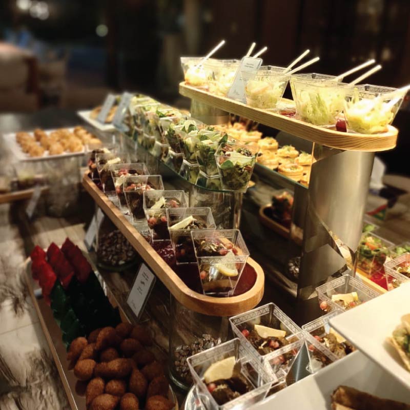 Luxury finger food buffet on dining room table Luxury finger food buffet on dining room table