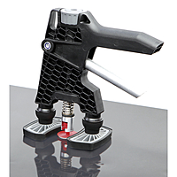 GYS glue lifter pulling a glue tab on a panel