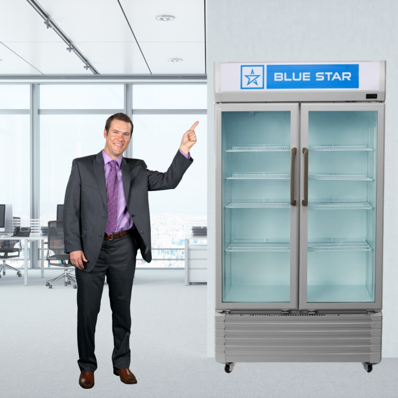 Customers browsing products in a Blue Star VC590D Visi Cooler.