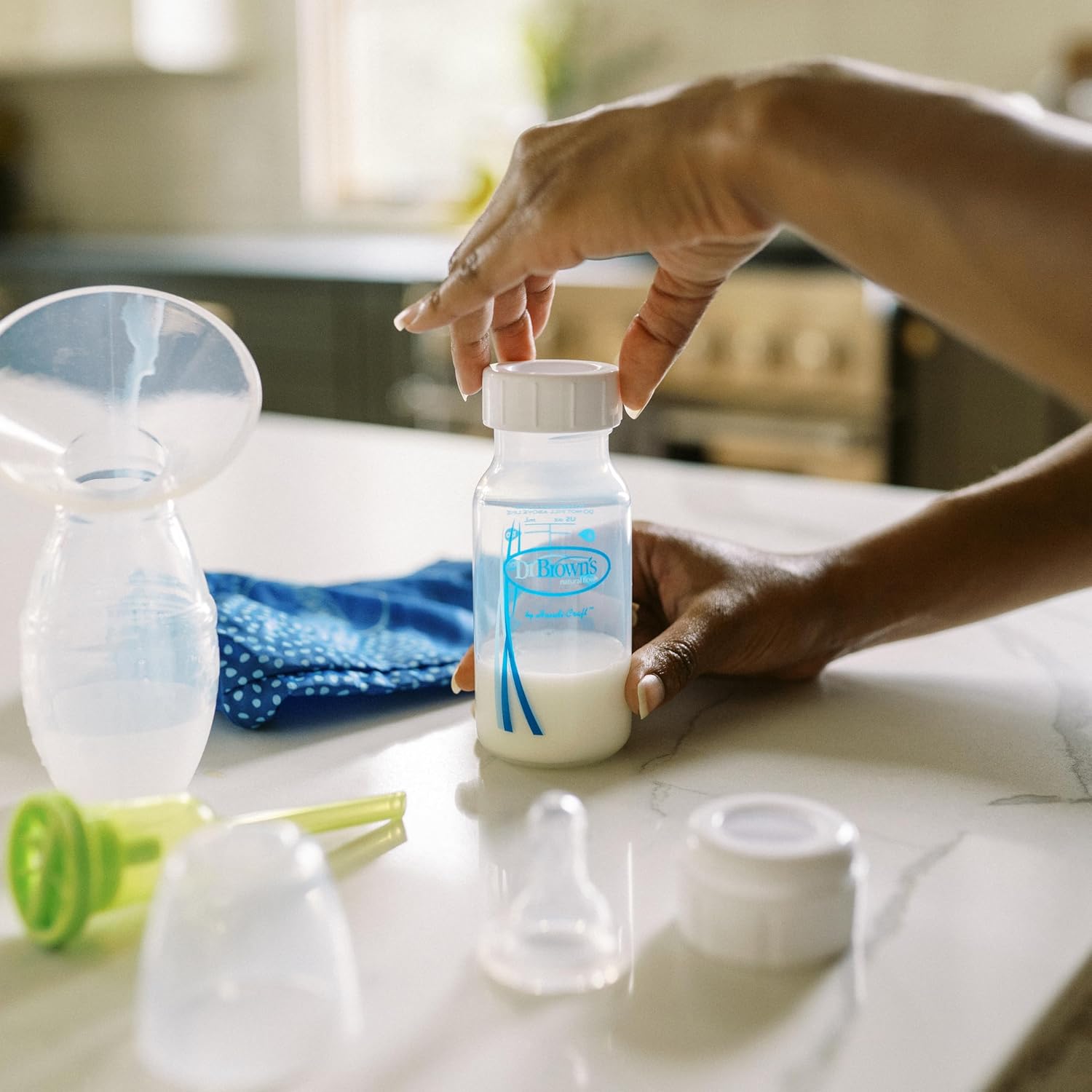 Dr. Brown's One-Piece Silicone Collector with Baby Bottle and Travel Bag