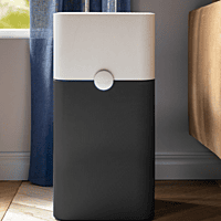 A family enjoying fresh, clean air in their living room thanks to their Blueair air purifier. A family enjoying fresh, clean air in their living room thanks to their Blueair air purifier.