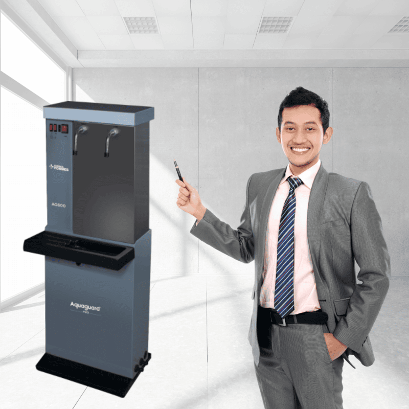 A glass of pure water being filled from the high-flow tap of the Aquaguard UV Water Purifier.