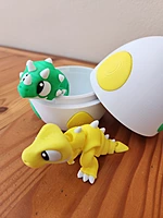 Dino Egg with flexi Triceratops and T-Rex