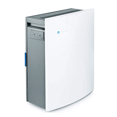 The sleek, steel body of the Blueair Classic 280i WIFI Smart Air Purifier in a modern living room.