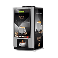 A person dispensing a quick cup of coffee from the Atlantis best coffee makers. A person dispensing a quick cup of coffee from the Atlantis best coffee makers.