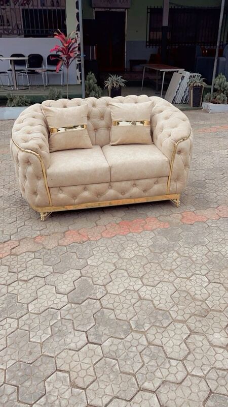 2-seater brown chesterfield sofa