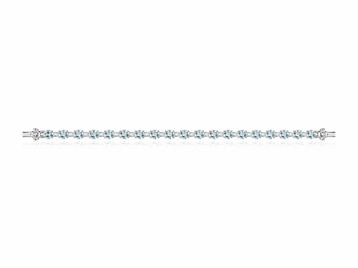 Pulsera tenis de oro blanco y piedras celestes