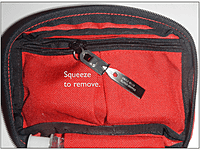 Squeeze to remove the tweezers from the clip.