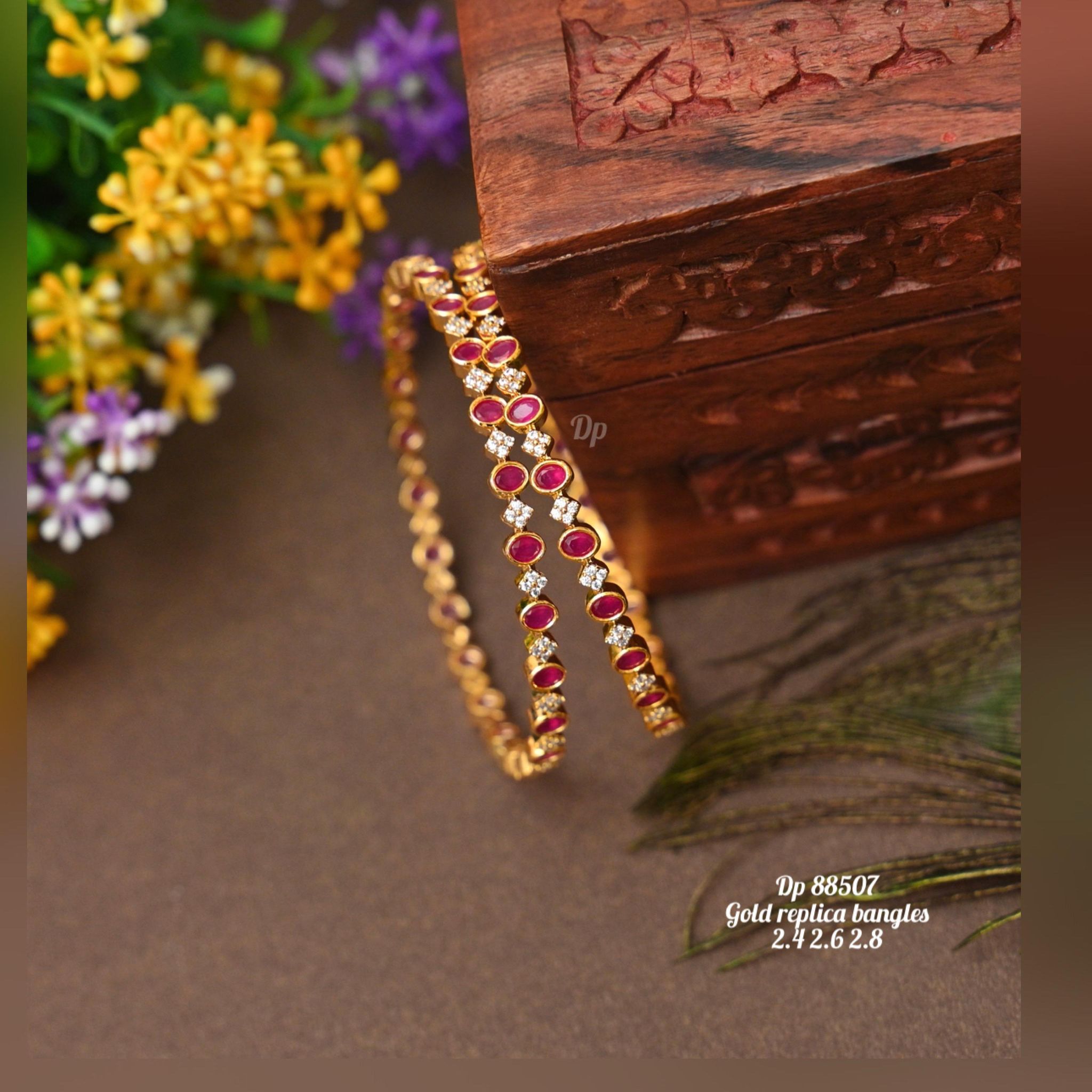 V817:Beautiful Gold Replica Bangles